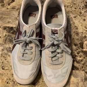 Puma Onitsuka Tiger tennis shoes. Size 10 mens. Like new condition.